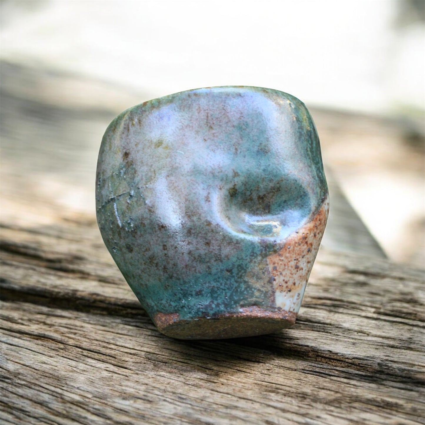 Multi- Colored Thumb Cup